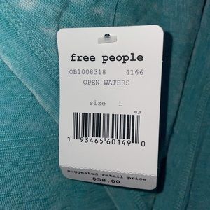 Free People light aqua/green shirt! Open back!